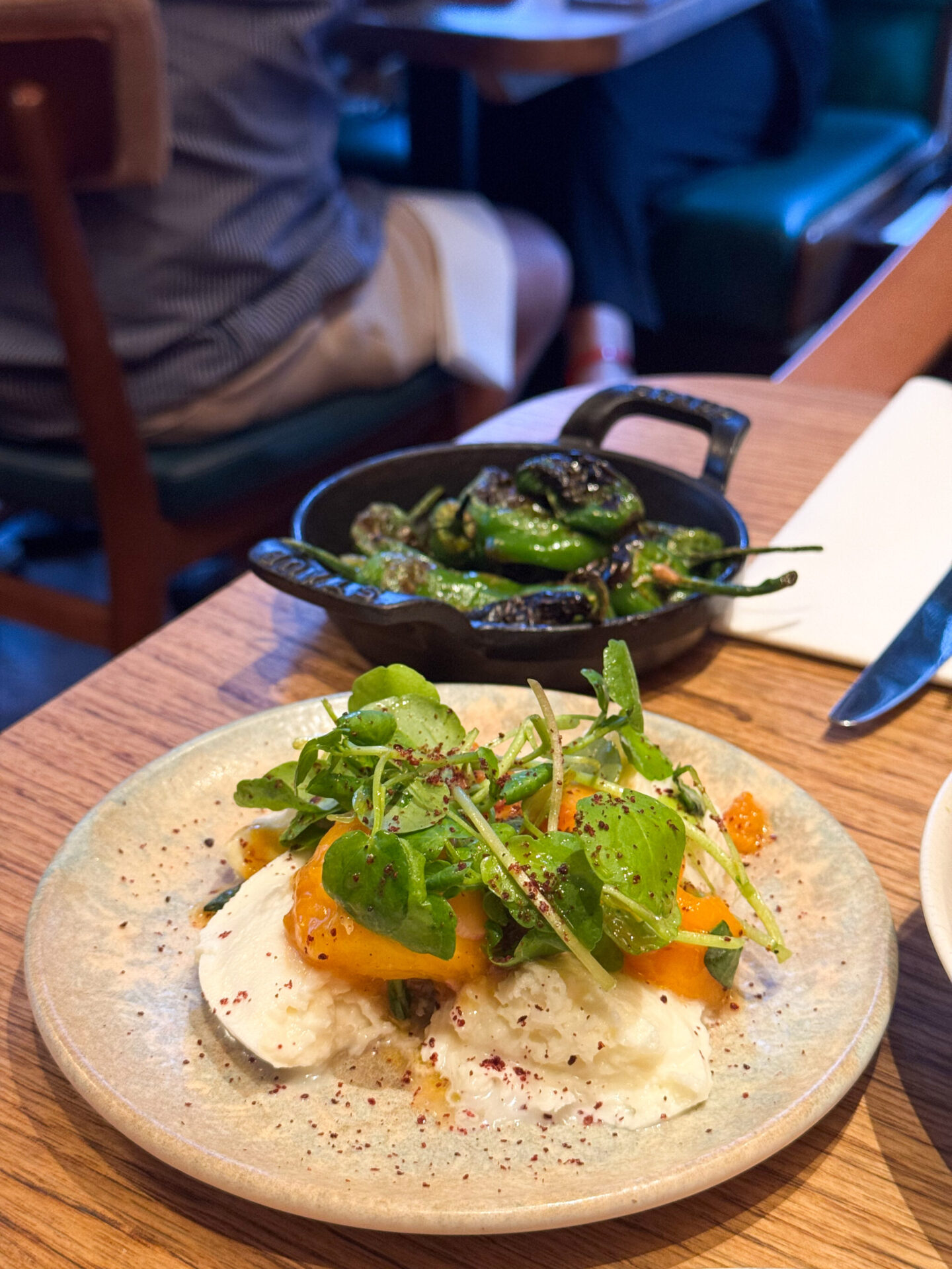 Padr&oacute;n peppers and burrata with peaches at Burnt Orange in Brighton 