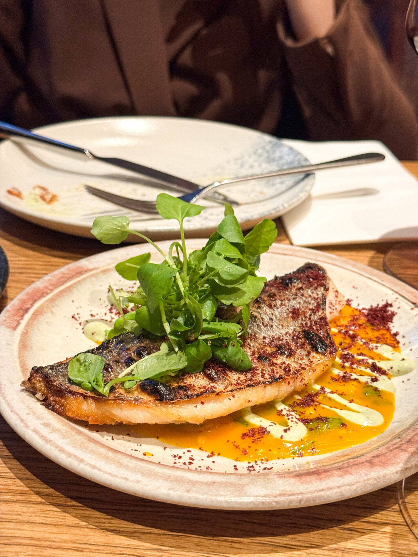 Grilled seabass with aubergine dish at Burnt Orange Brighton 